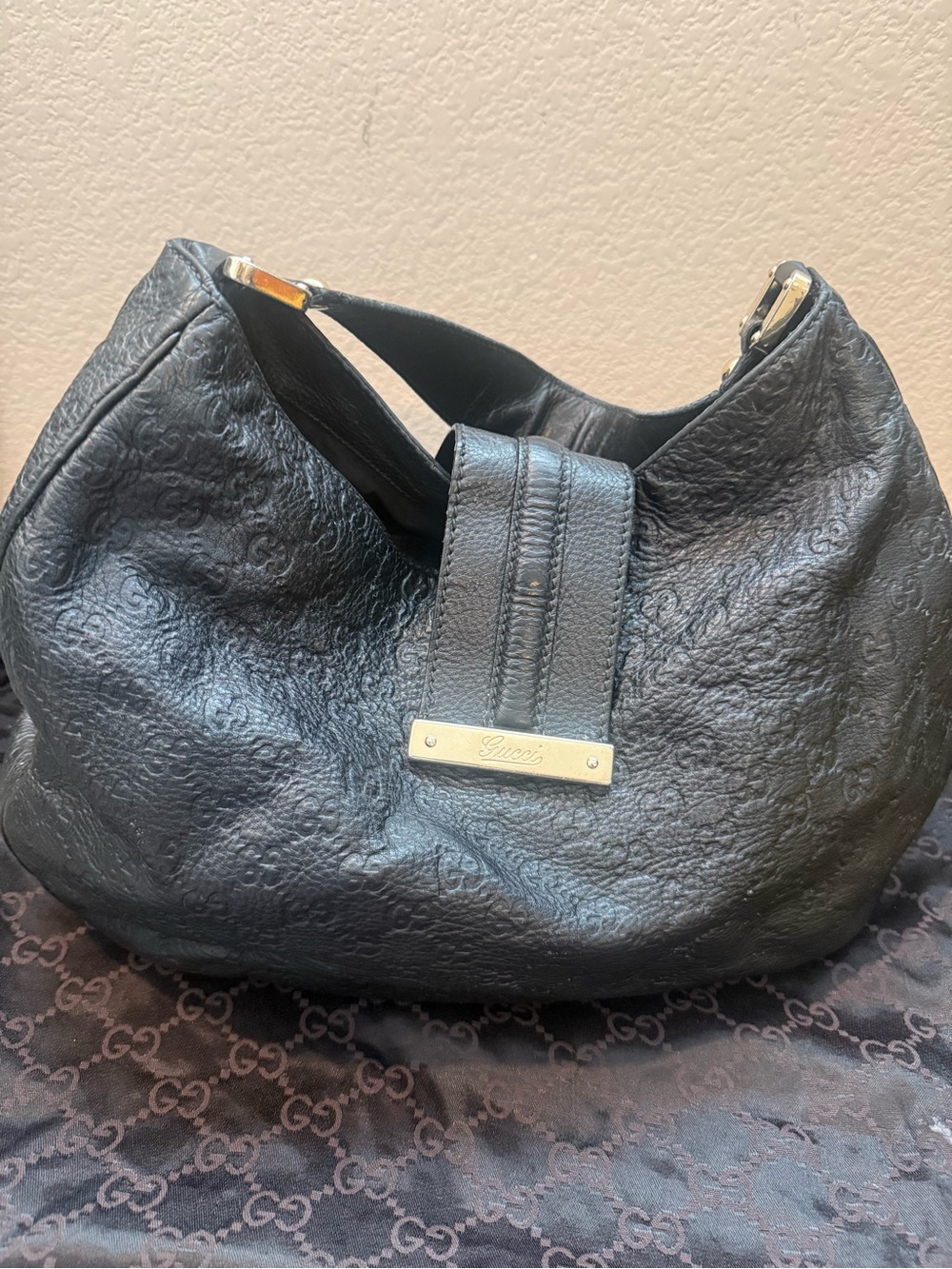 Gucci Embossed Black Leather Hobo with Signature Plaque